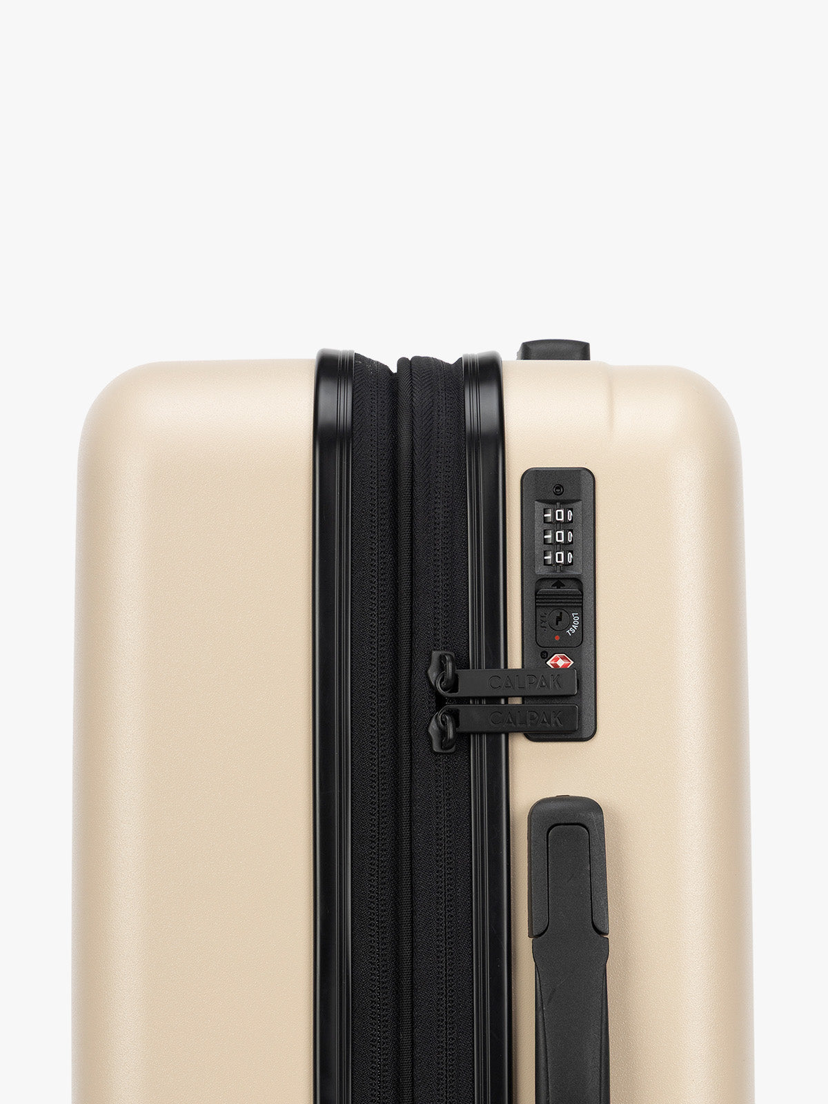 TSA Approved lock of the CALPAK Evry Carry-On Luggage in beige exterior and polka dot interior Polka Dot; LCO1020-POLKA-DOT