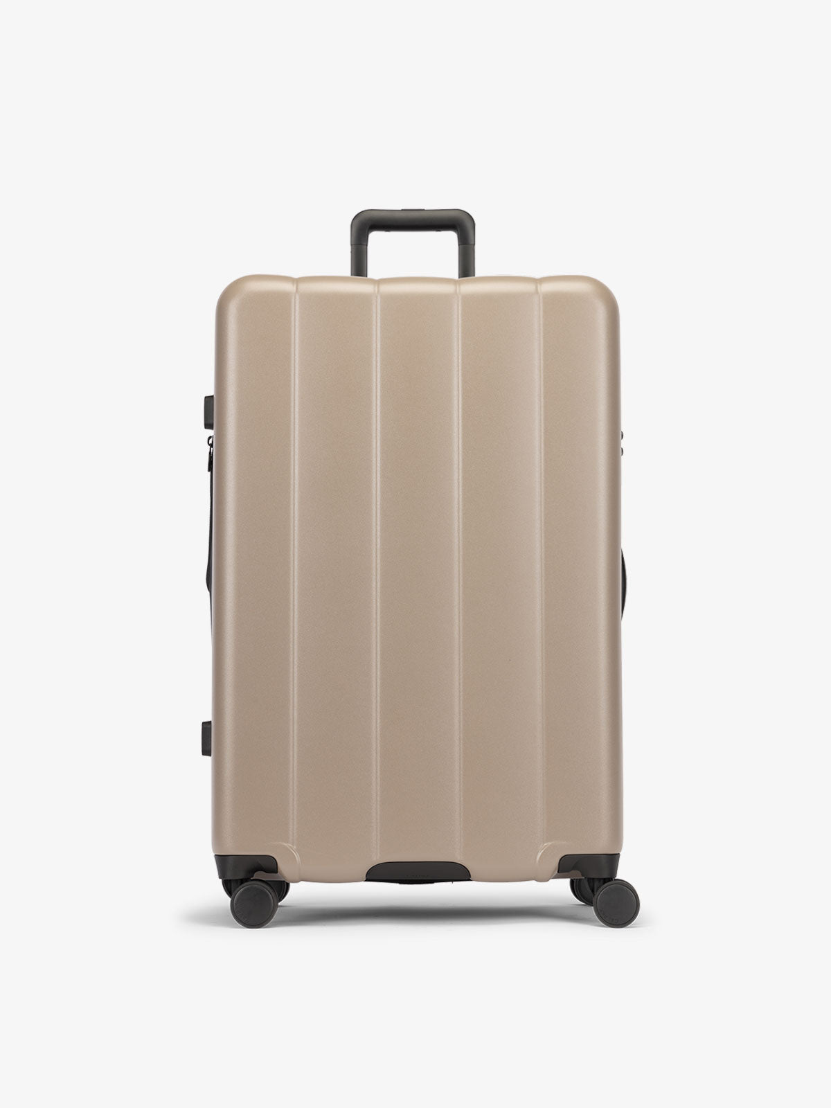 CALPAK Brown chocolate large luggage made from an ultra-durable polycarbonate shell and expandable by up to 2"; LCO1028-CHOCOLATE
