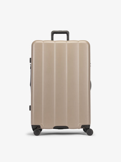 CALPAK Brown chocolate large luggage made from an ultra-durable polycarbonate shell and expandable by up to 2; LCO1028-CHOCOLATE view 1