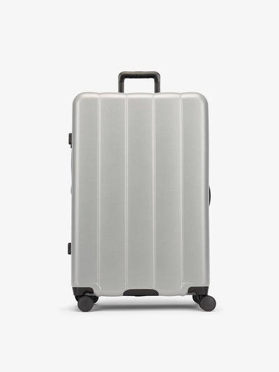 CALPAK Gray smoke large luggage made from an ultra-durable polycarbonate shell and expandable by up to 2; LCO1028-SMOKE view 1