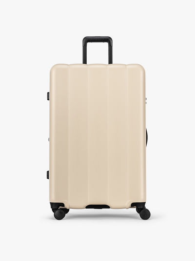 CALPAK Evry Large Luggage in beige exterior and interior polka dot in Polka Dot; LCO1028-POLKA-DOT view 1