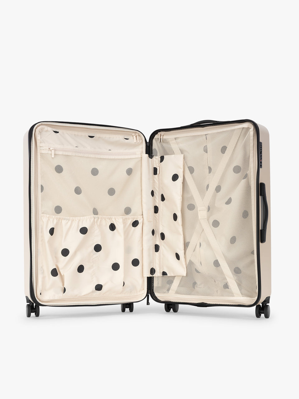 Interior of CALPAK Evry Large Luggage in beige exterior and interior polka dot in Polka Dot; LCO1028-POLKA-DOT