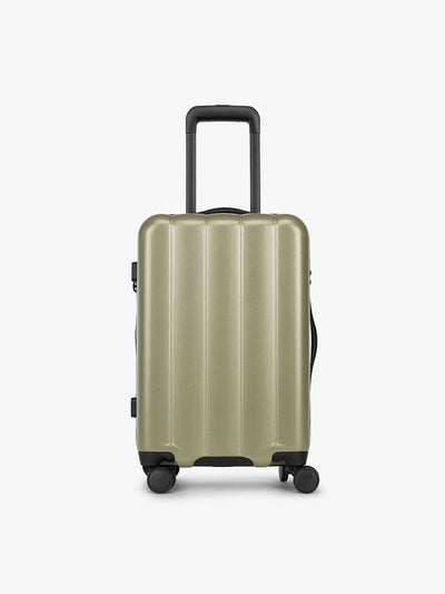 Pistachio green CALPAK carry-on luggage made from an ultra-durable polycarbonate shell and expandable by up to 2; LCO1020-PISTACHIO view 1