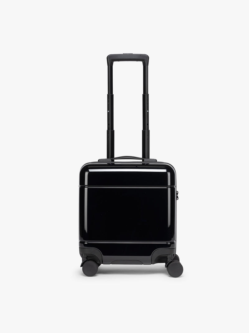 CALPAK Glazed Black Hue Mini Carry On suitcase with a black handle on a white background