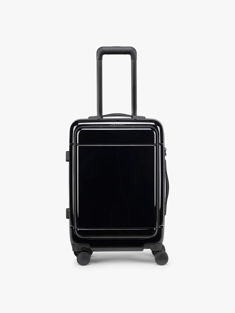 Front view of CALPAK Hue Front Pocket Carry On Luggage in maroon Glazed Black
