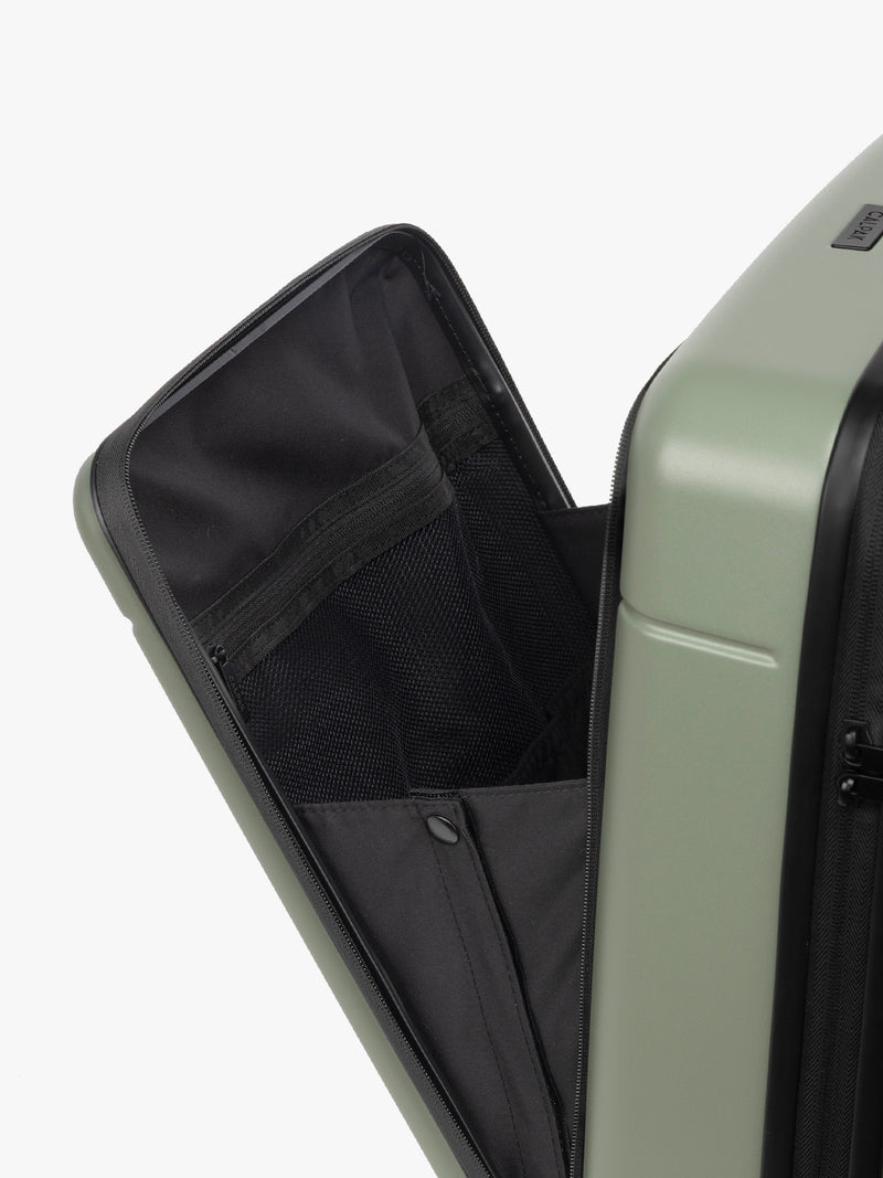 CALPAK Hue Front Pocket Carry On Luggage opened view in green Juniper