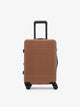 CALPAK Hue hard shell rolling carry-on luggage in pink sand color; LHU1020-NP-HAZEL