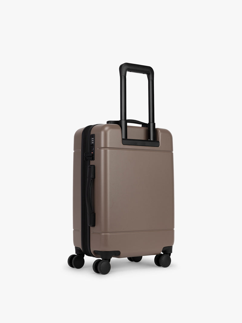 CALPAK Hue Carry On Luggage back view in brown Chocolate
