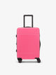 CALPAK Hue hard shell rolling carry on luggage in hot pink dragonfruit; LHU1020-NP-DRAGONFRUIT