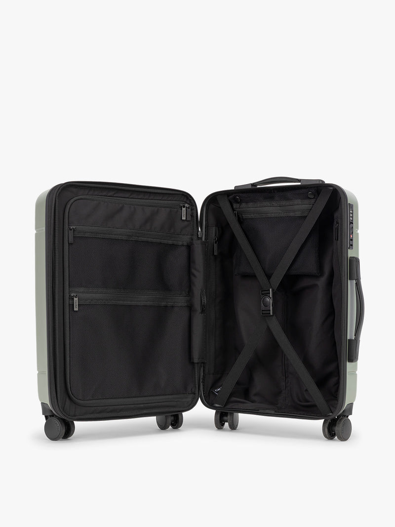 CALPAK Hue Front Pocket Carry On Luggage opened view in green Juniper