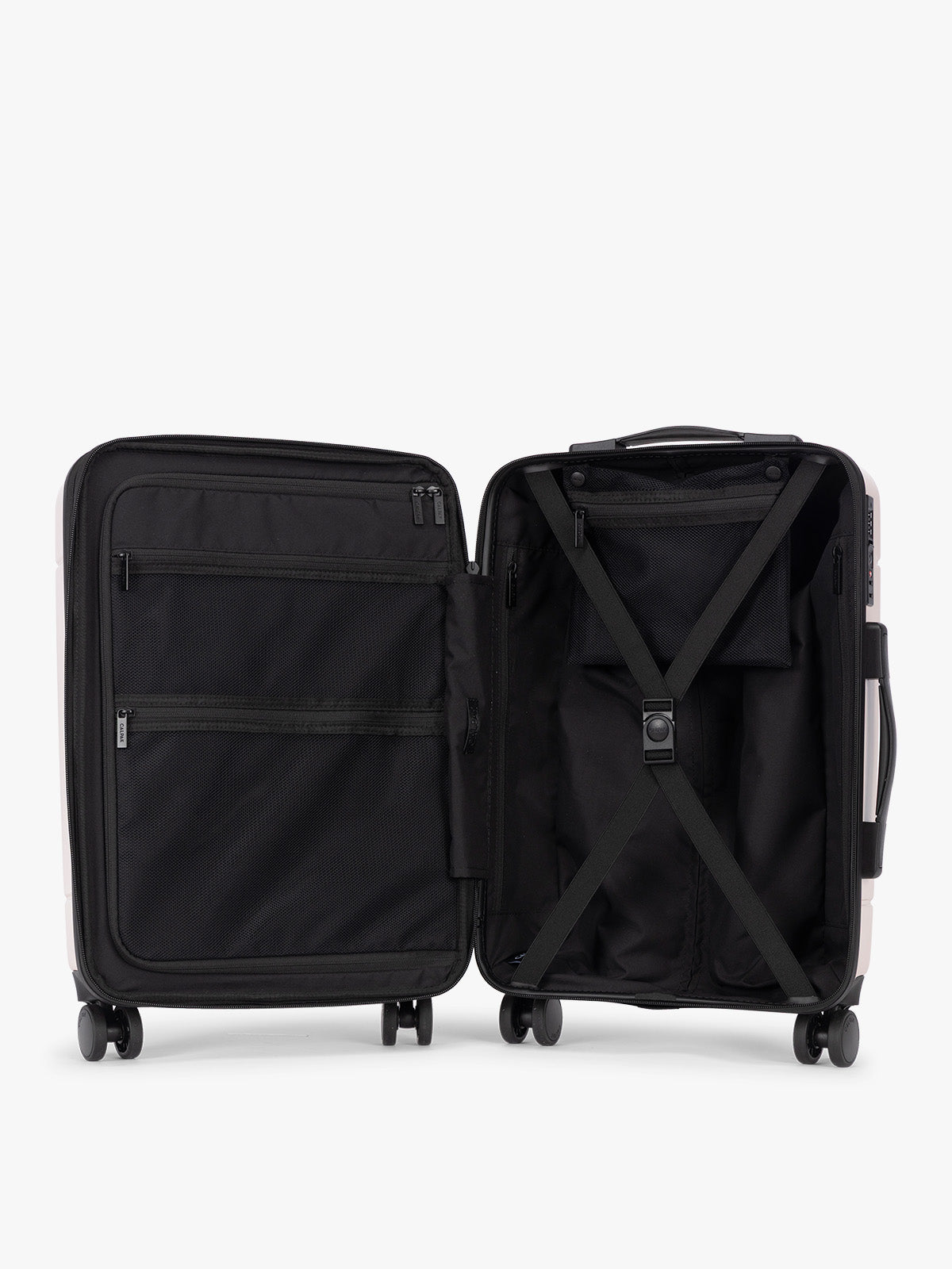Opened luggage view of CALPAK Hue Carry On Luggage in light pink Rose Quartz with handle and wheels on a white background; LHU1020-NP-ROSE-QUARTZ