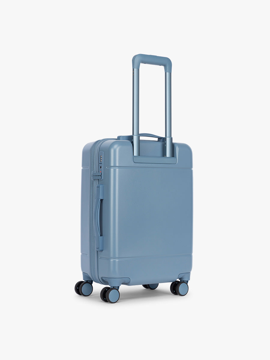 Back side of CALPAK Hue Carry On Luggage in light blue French Blue ; LHU1020-NP-FRENCH-BLUE