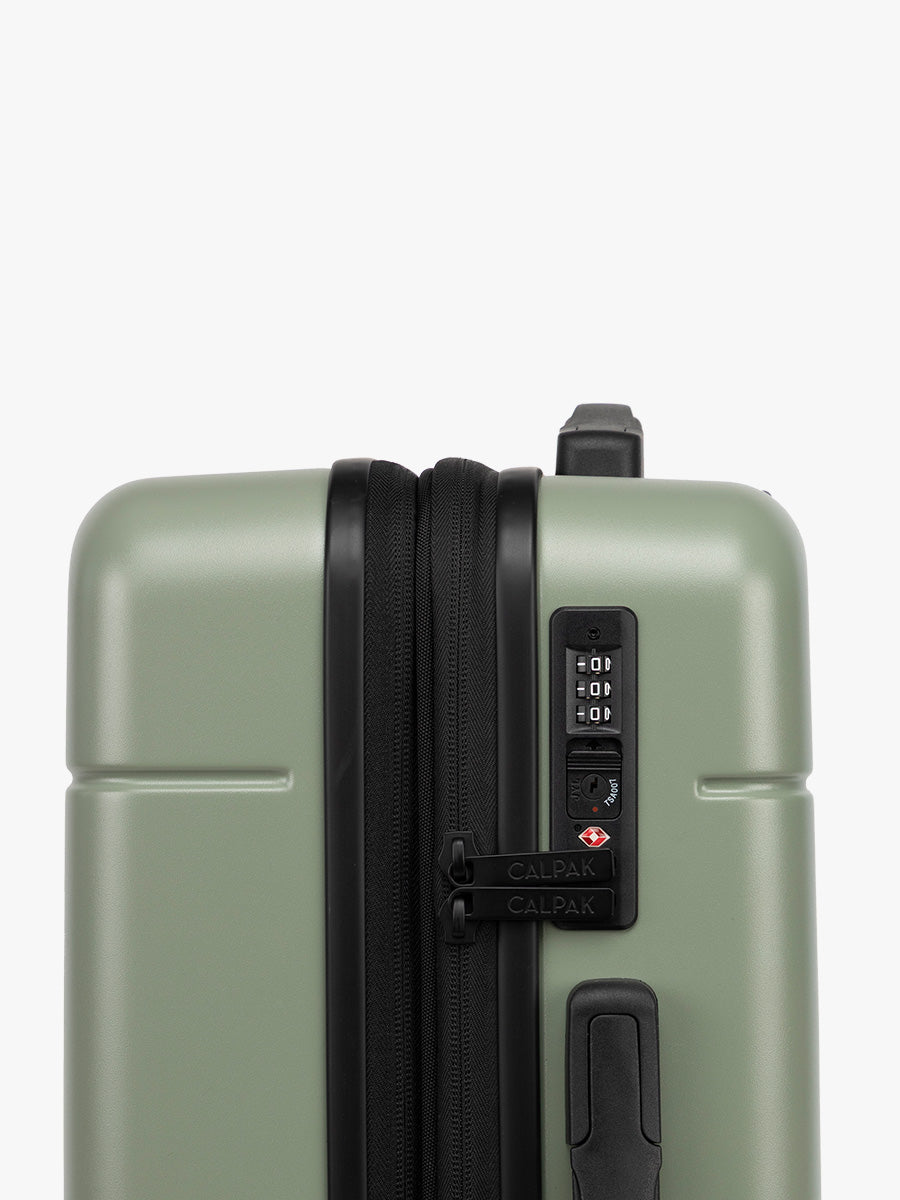 CALPAK Hue Medium Luggage side view with TSA lock in green Juniper; LHU1024-JUNIPER