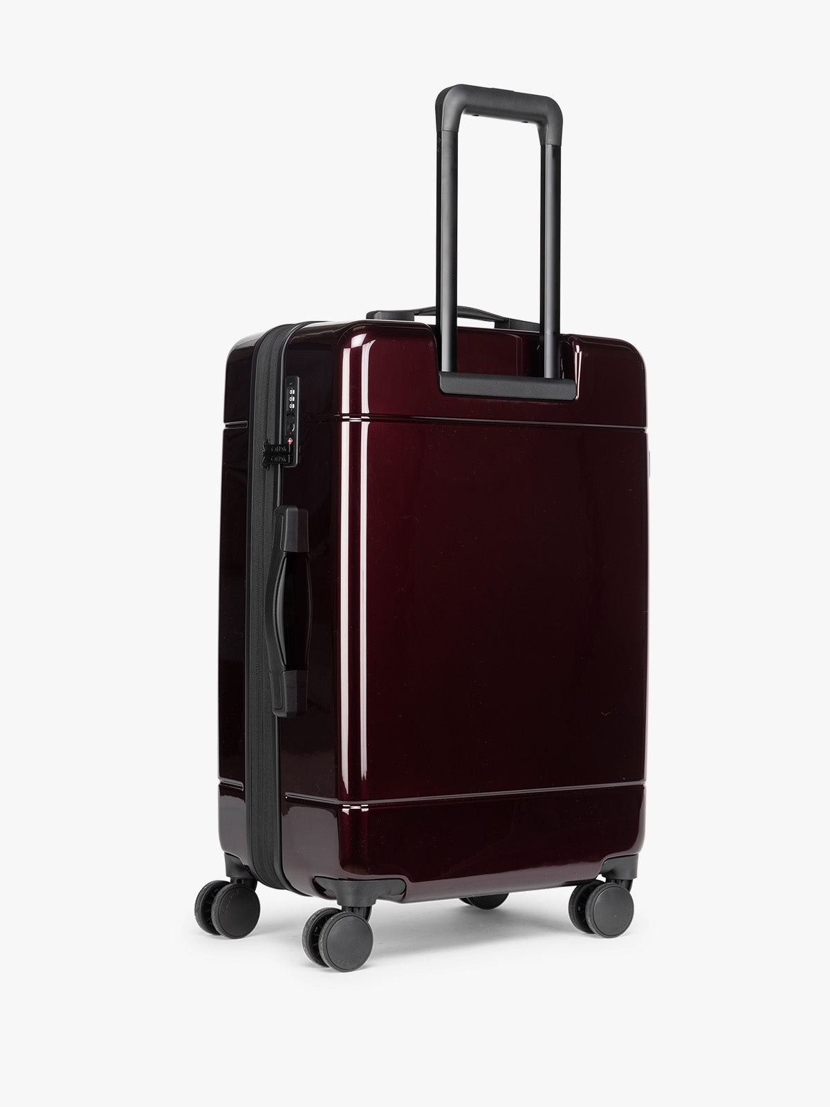 Back view of CALPAK Hue Medium Luggage in maroon Glazed Dark Cherry; LHU1024-GLAZED-DARK-CHERRY