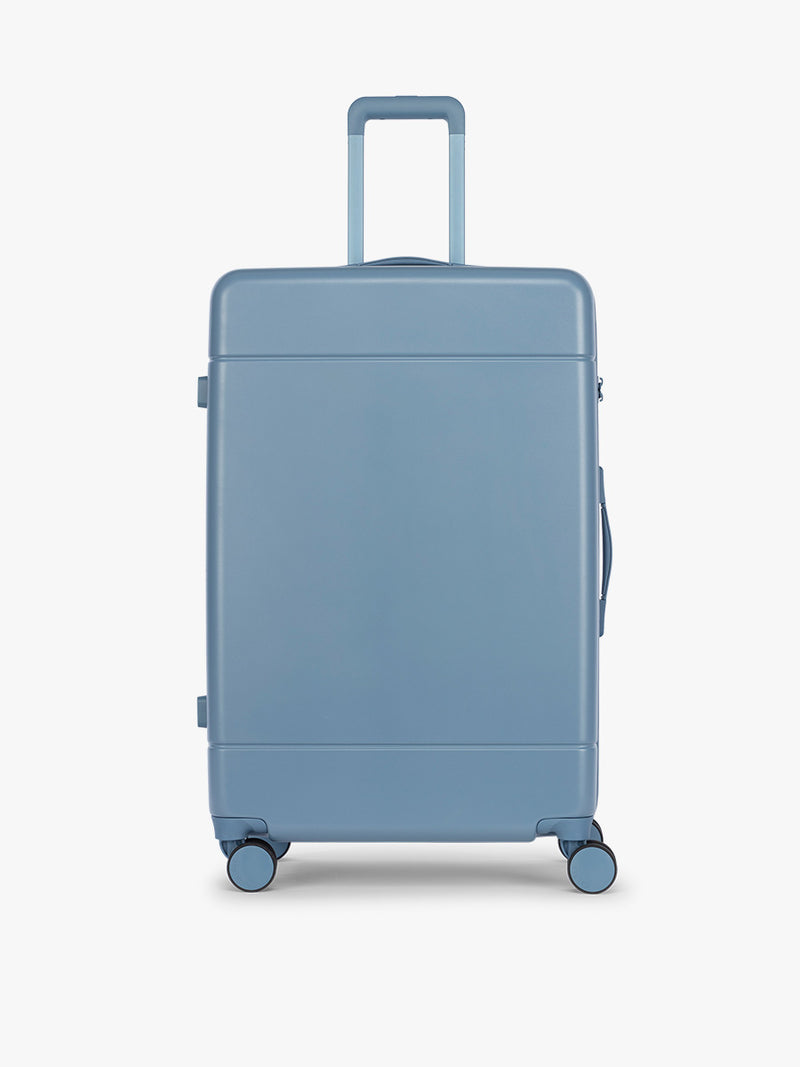 CALPAK Hue Large Luggage in light blue French Blue and blue and white gingham interior