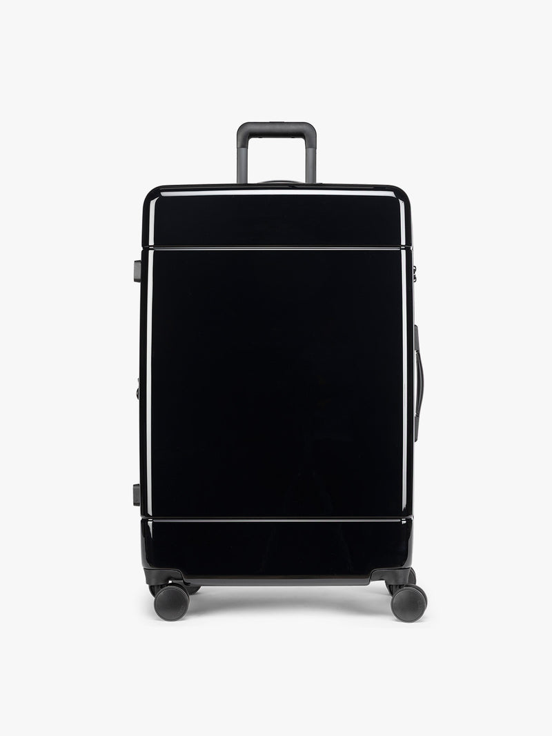 CALPAK black Hue Large Luggage in Glazed Black