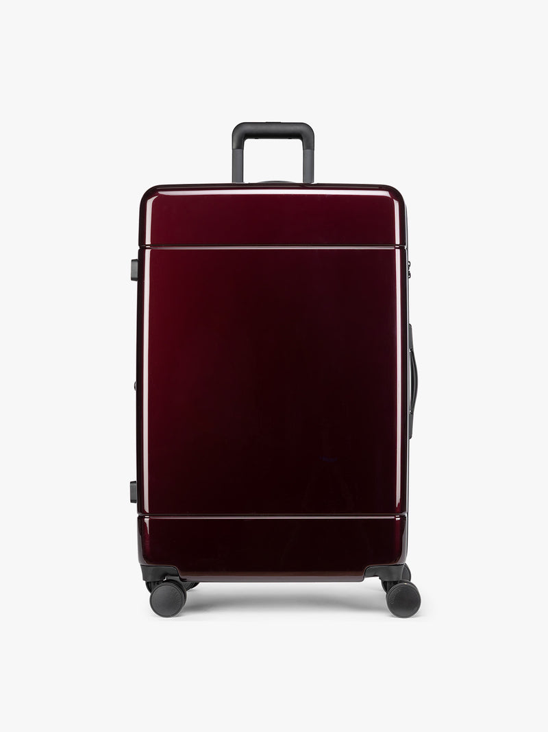 CALPAK maroon Hue Large Luggage in Glazed Dark Cherry