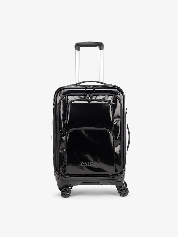 Studio product shot of front-facing CALPAK Terra Carry-On luggage with soft shell and 360 spinner wheels in obsidian