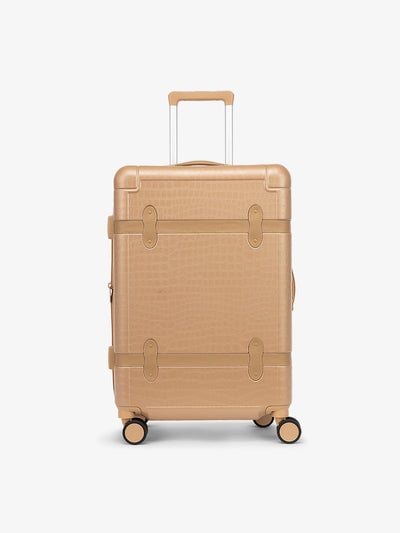 CALPAK TRNK medium 25 inch luggage with 360 spinner wheels and faux crocodile design in vintage trunk style in Almond; LTK1024-ALMOND