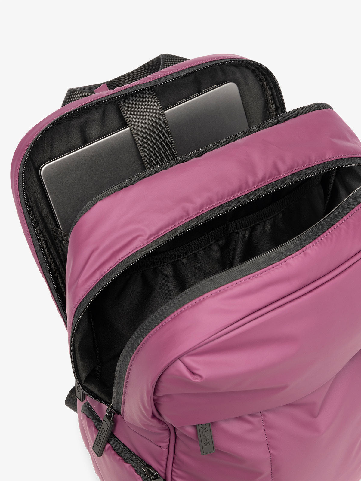 CALPAK Luka 15 Inch Laptop Backpack with soft puffy exterior and multiple pockets in purple; BPL2001-PLUM