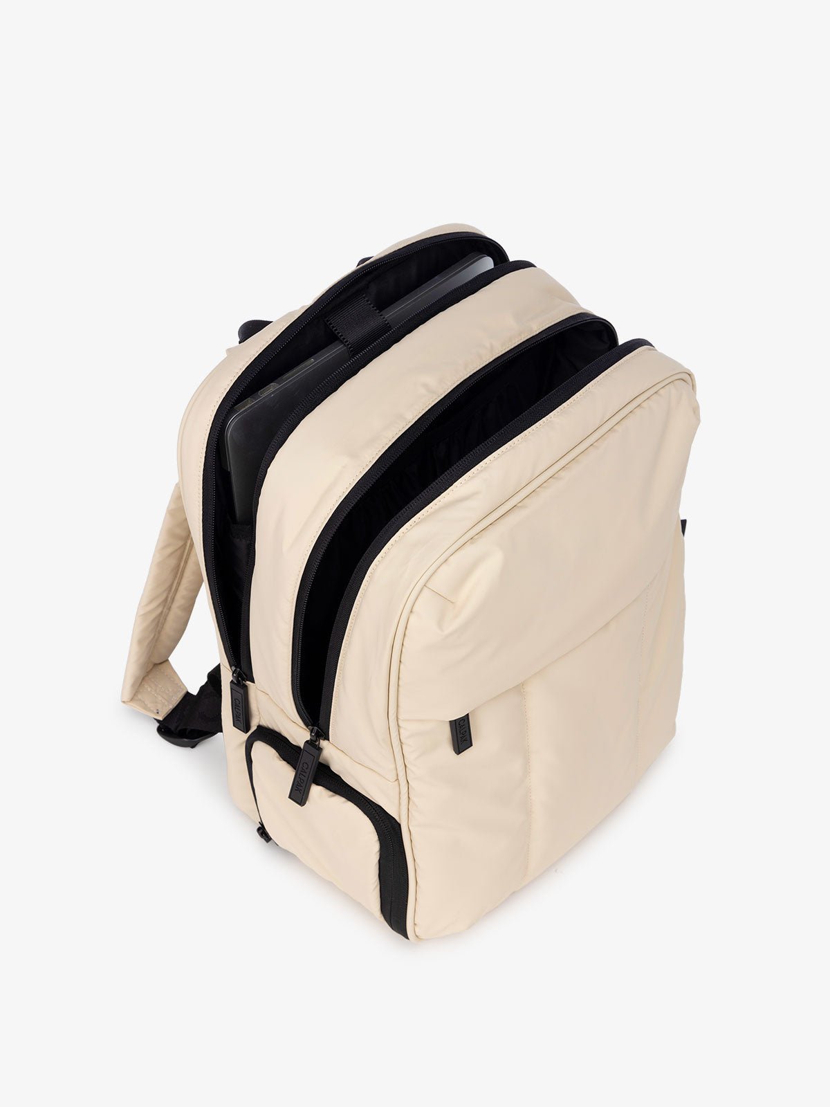 cream travel laptop backpack with laptop sleeve