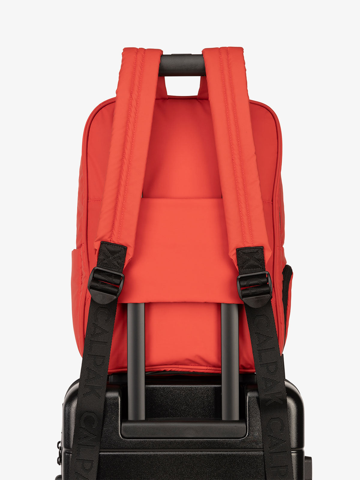 CALPAK water resistant Luka Laptop Backpack with adjustable shoulder straps and trolley sleeve in red; BPL2001-ROUGE