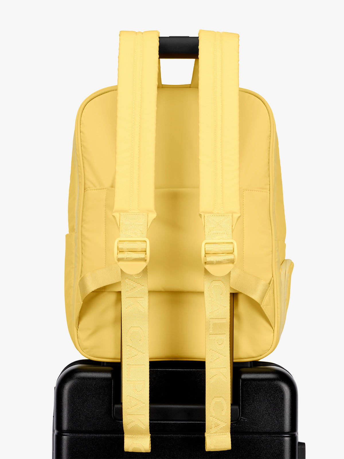 CALPAK water resistant Luka Laptop Backpack with adjustable shoulder straps and trolley sleeve in yellow; BPL2001-BUTTER