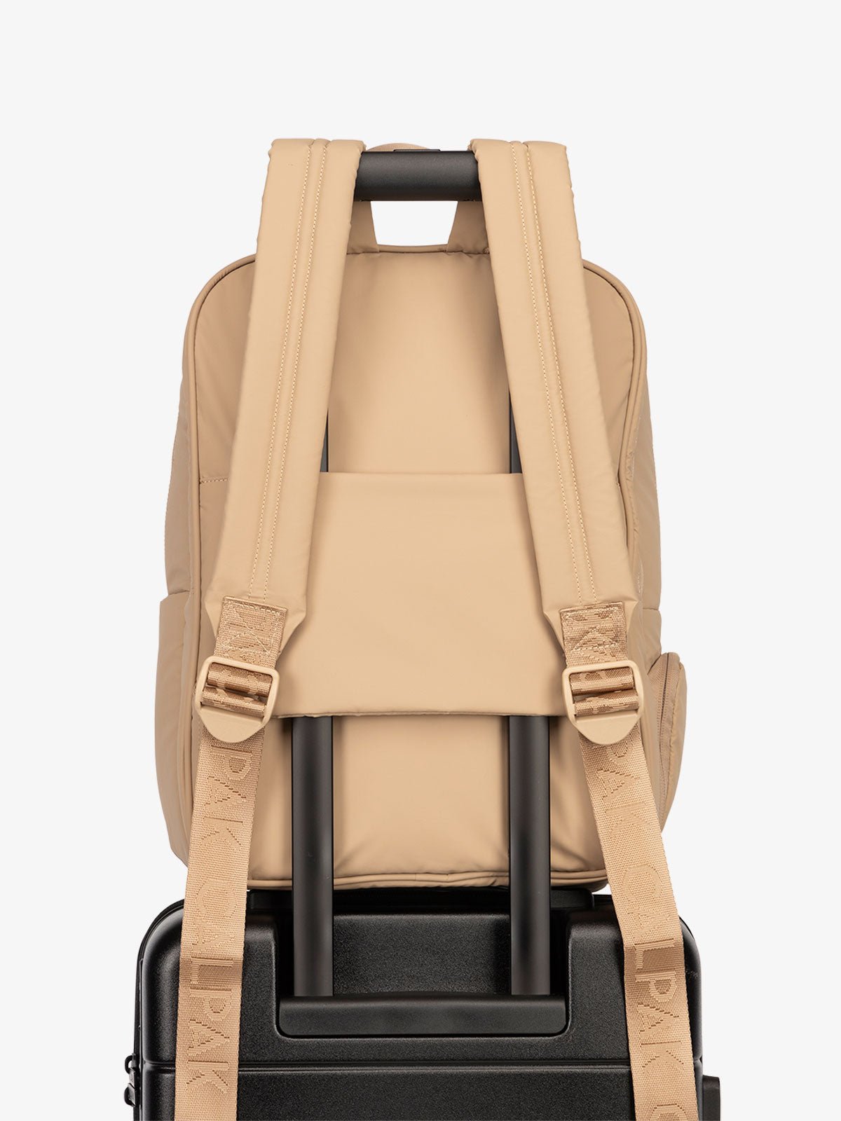 CALPAK water resistant Luka Laptop Backpack with adjustable shoulder straps and trolley sleeve in latte