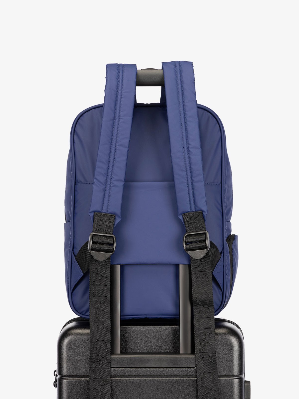 CALPAK water resistant Luka Laptop Backpack with adjustable shoulder straps and trolley sleeve in navy blue