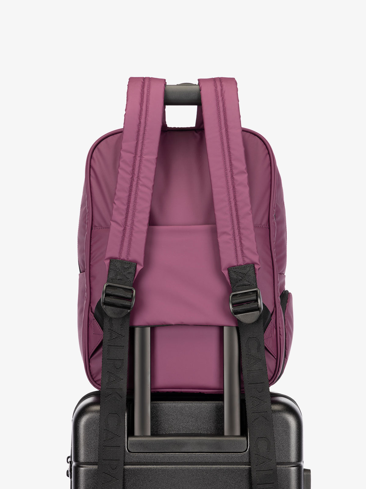 CALPAK water resistant Luka Laptop Backpack with adjustable shoulder straps and trolley sleeve in purple plum; BPL2001-PLUM