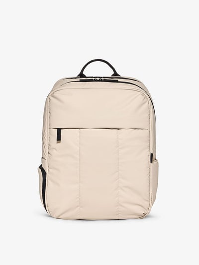 CALPAK Luka 17 inch Laptop Backpack featuring soft, puffy exterior and water resistant lining in oatmeal; BPX2301-OATMEAL
