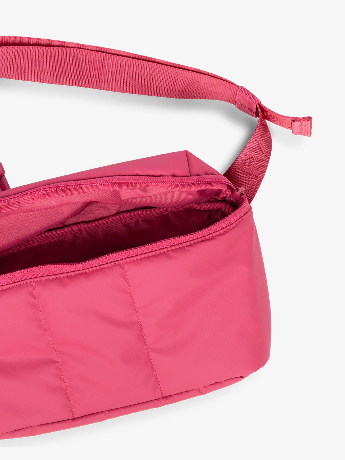 CALPAK Luka Belt Bag close up interior and strap in pink dragonfruit; BB1901-DRAGONFRUIT