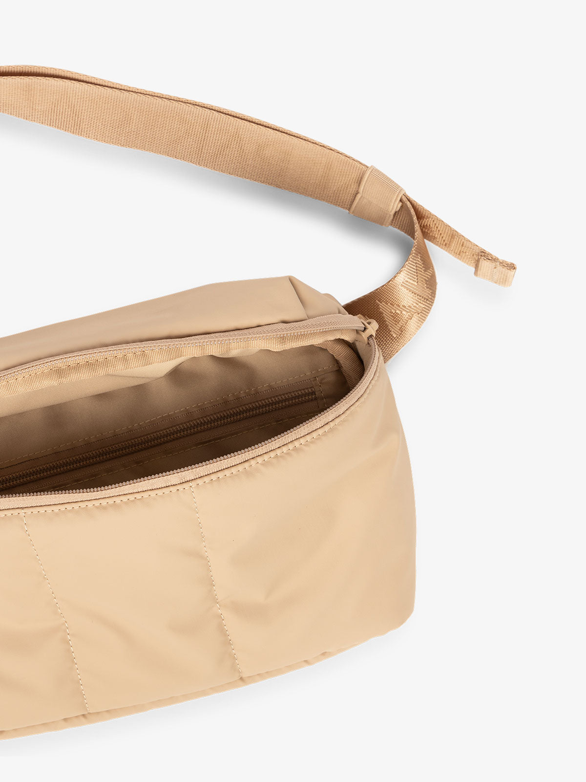 CALPAK Luka Belt Bag close up interior and strap in latte brown; BB1901-LATTE