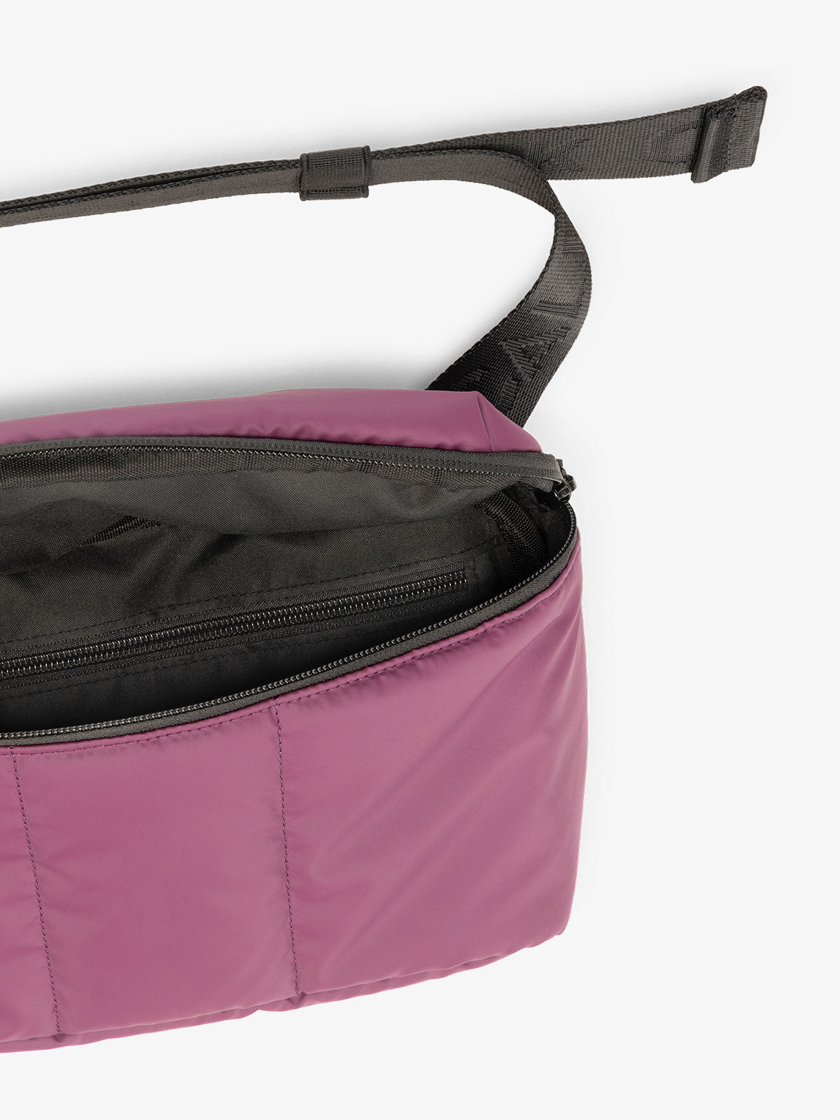 CALPAK Luka Belt Bag close up interior and strap in purple plum; BB1901-PLUM