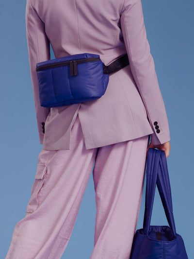 CALPAK Luka Belt Bag with soft puffy exterior in navy blue; BB1901-NAVY view 2