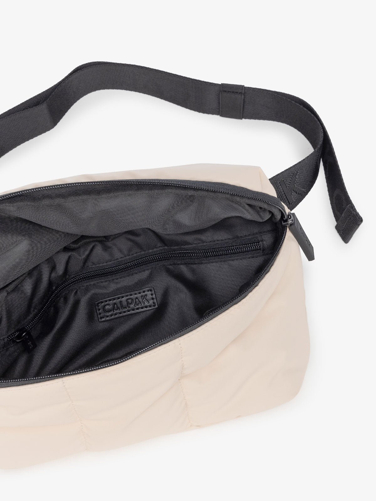 Luka belt bag with adjustable crossbody strap and interior pocket in ivory