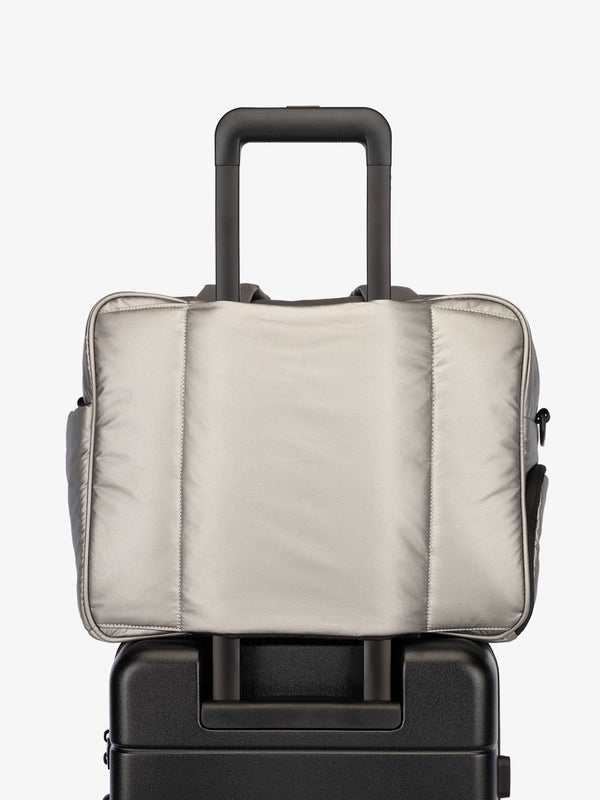 CALPAK Luka Duffel bag with luggage trolley sleeve in metallic gray