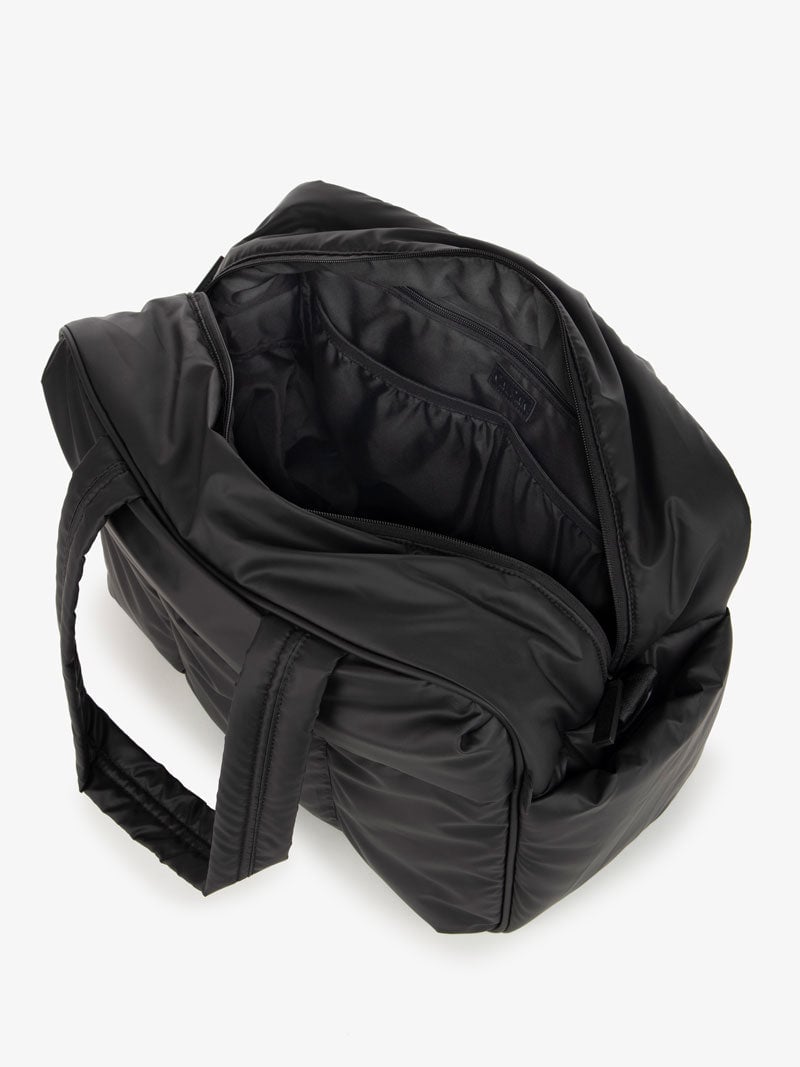 Luka duffel bag interior with multiple interior pockets in matte black