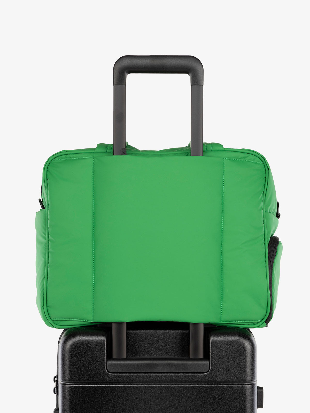 CALPAK Luka Weekender Duffel Bag with trolley sleeve for travel in green