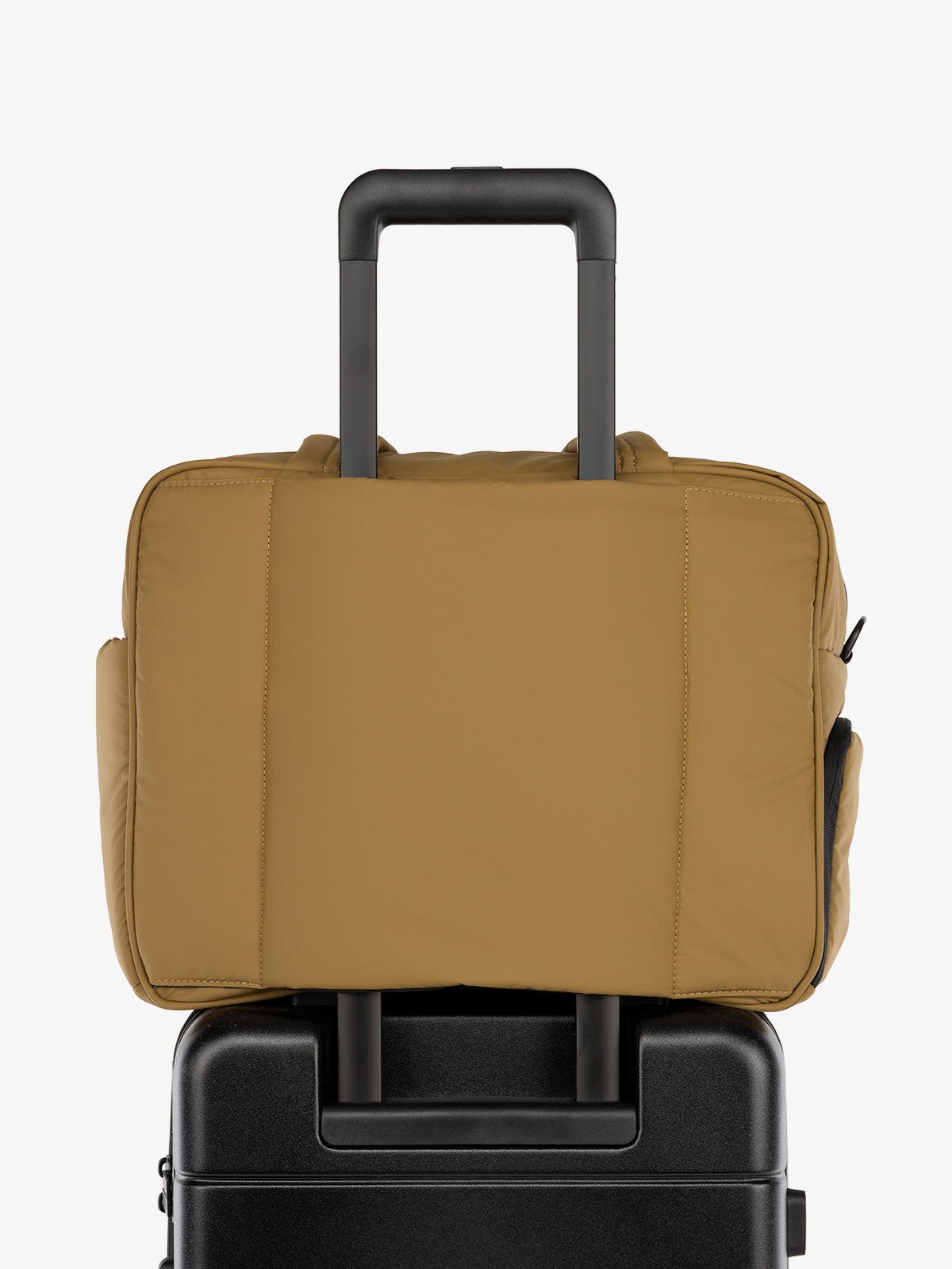 CALPAK Luka Weekender Duffel Bag with trolley sleeve for travel in brown