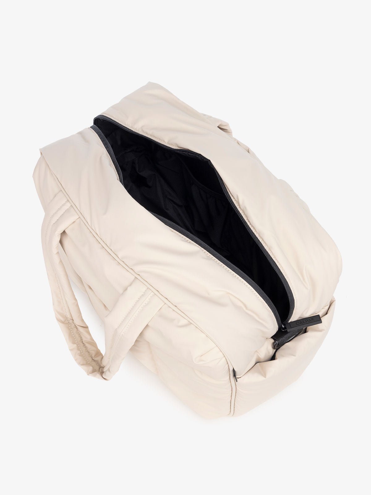 Luka duffel bag interior with multiple interior pockets in ivory