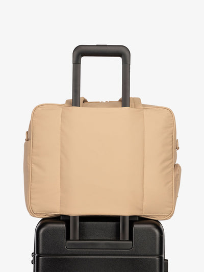 CALPAK Luka Duffel bag with luggage trolley sleeve in light brown latte
