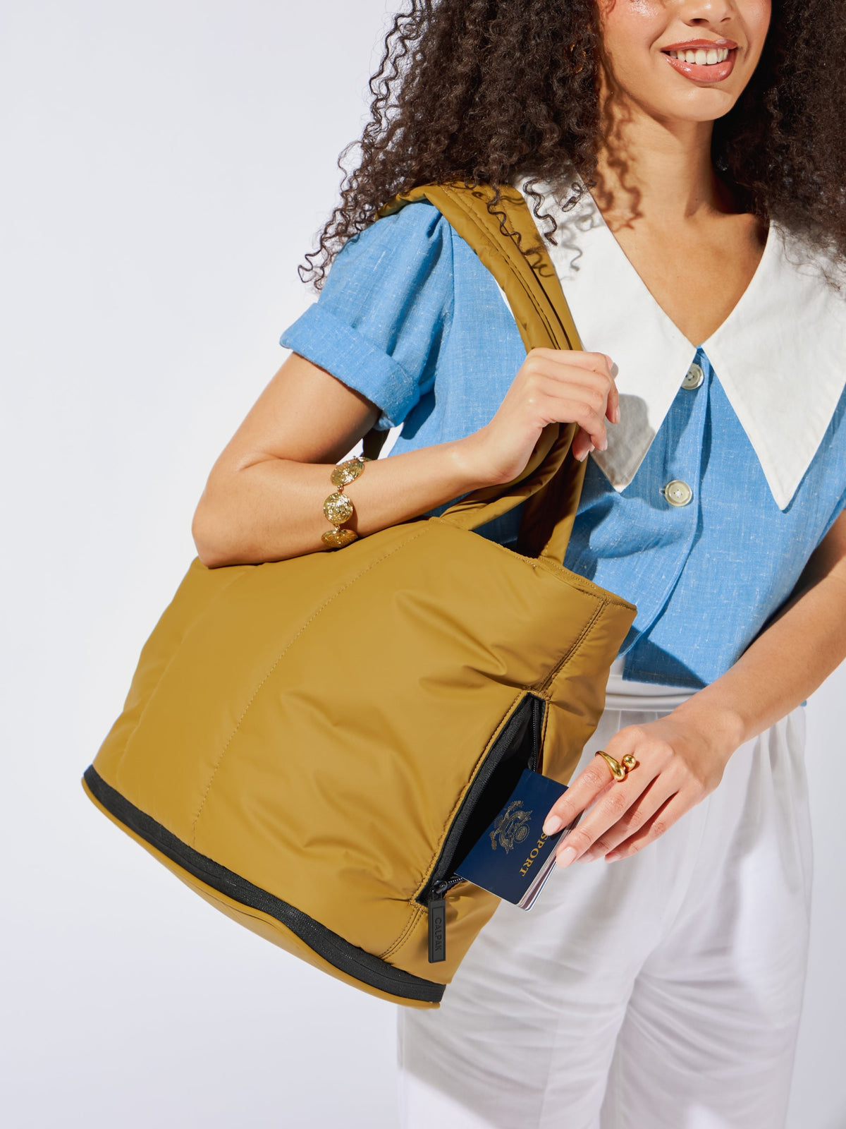 CALPAK Luka expandable laptop bag with hidden zippered pocket and padded straps in brown; ALT2201-KHAKI