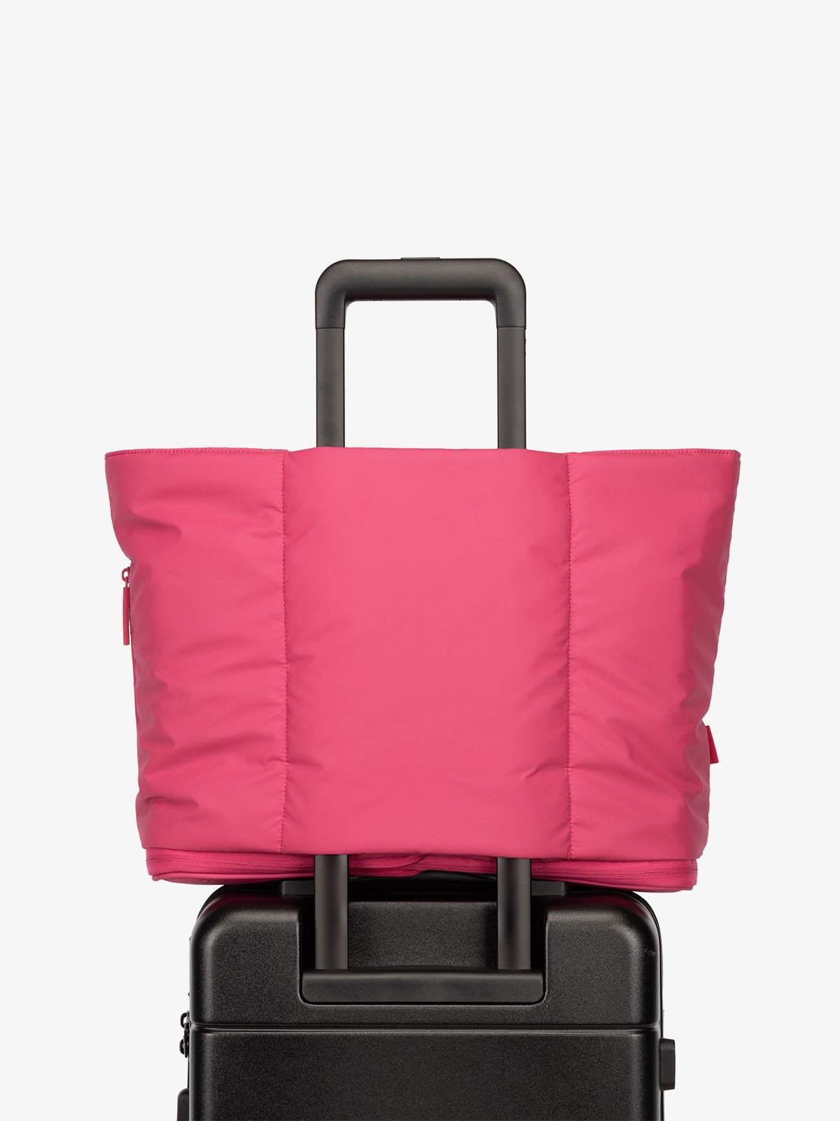 CALPAK Luka expandable travel bag with laptop compartment and trolley sleeve in pink dragonfruit