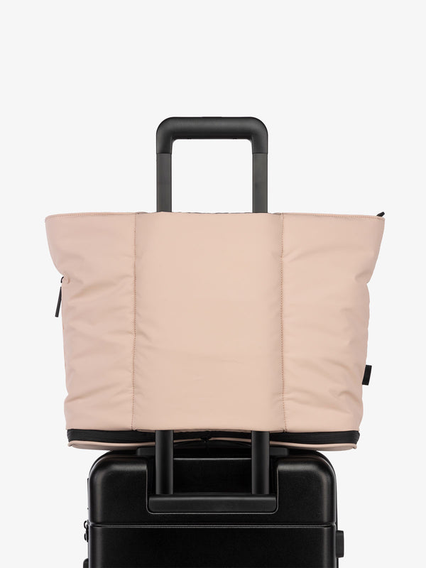 CALPAK Luka expandable travel bag with trolley sleeve and laptop compartment in rose quartz pink