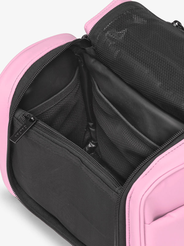 CALPAK Luka Hanging Toiletry Bag with water-resistant lining and mesh pockets for toiletries and makeup in pink bubblegum