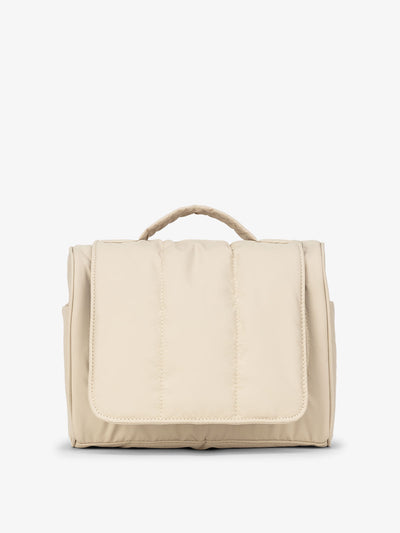 CALPAK Luka Hanging Toiletry Bag with carrying handle in beige oatmeal; TLH2301-OATMEAL view 1