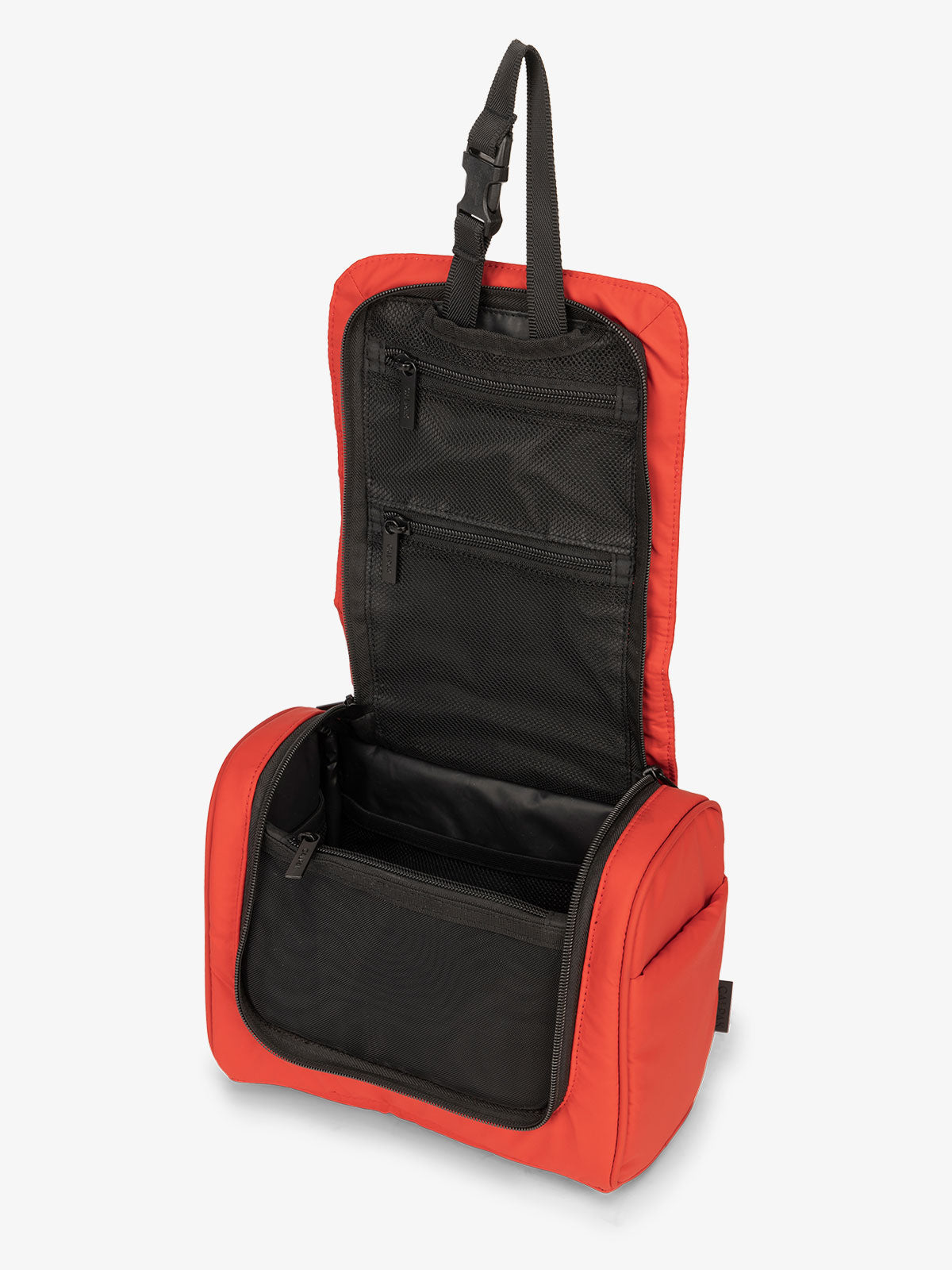 CALPAK Luka Hanging Toiletry Bag with multiple interior pockets and retractable hanging strap in red rouge; TLH2301-ROUGE
