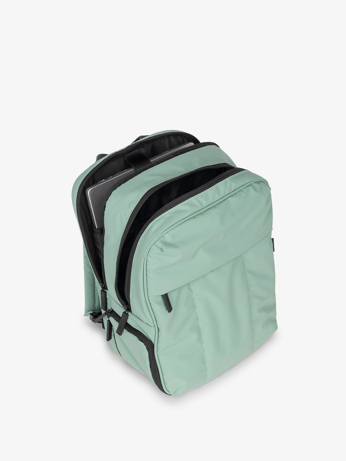 CALPAK Luka 15 Inch Laptop Backpack with multiple compartments and soft puffy exterior in green; BPL2001-SAGE