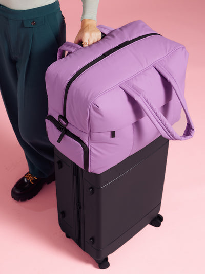 CALPAK Luka large duffle bag with detachable strap and zippered front pocket in lavender lilac; DLL2201-LILAC